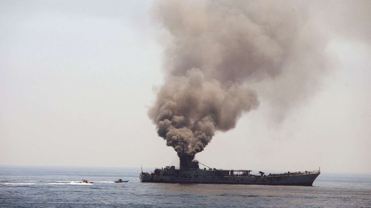 Iran's elite Revolutionary Guard boats attack a naval vessel during a three-day military drill in the Gulf on April 22, 2010. Iran's elite Revolutionary Guards launched a new "ultra-fast" boat capable of causing high destruction after testing it in a key oil supply route, at the start of a three-day military drill. AFP PHOTO/FARS NEWS/MEHDI MARIZAD (Photo credit should read MEHDI MARIZAD/AFP via Getty Images)