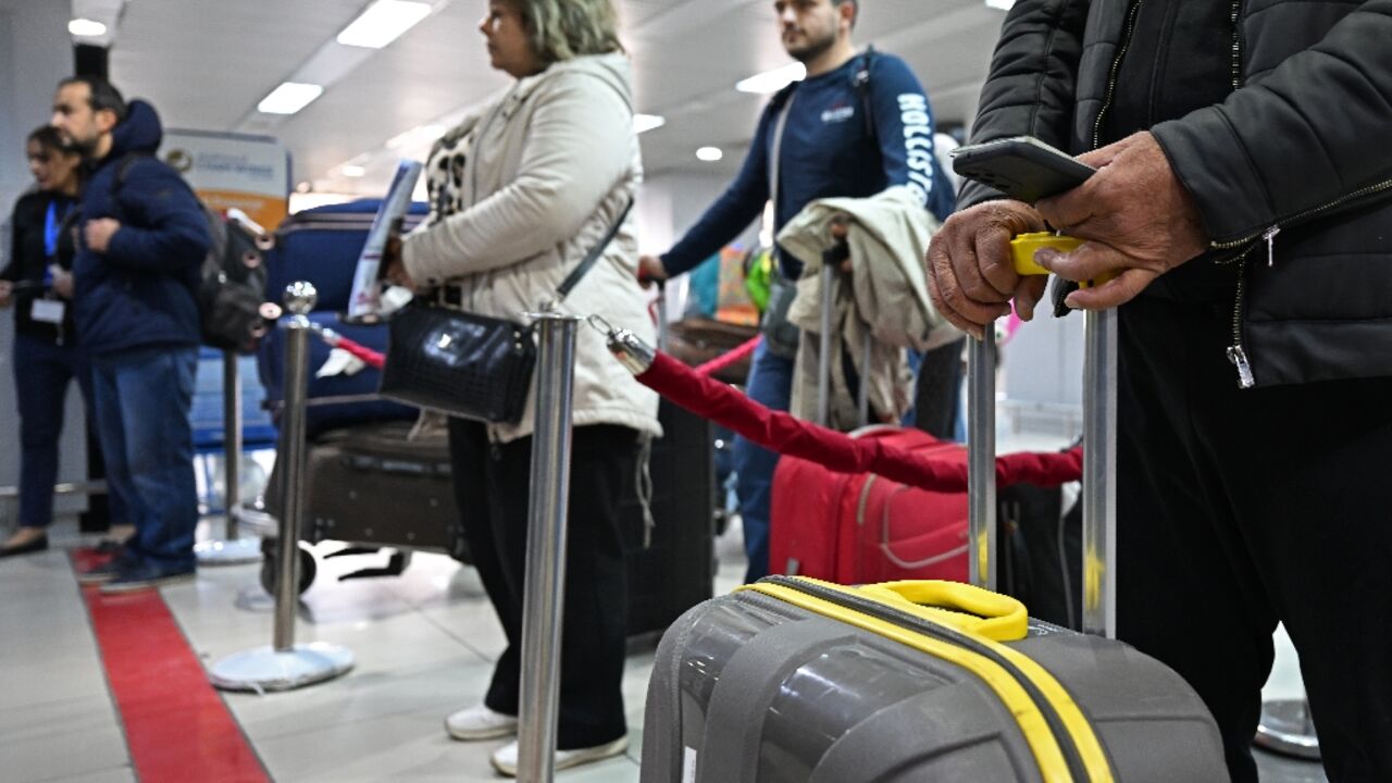 Travellers at Damascus airport on January 7, 2025