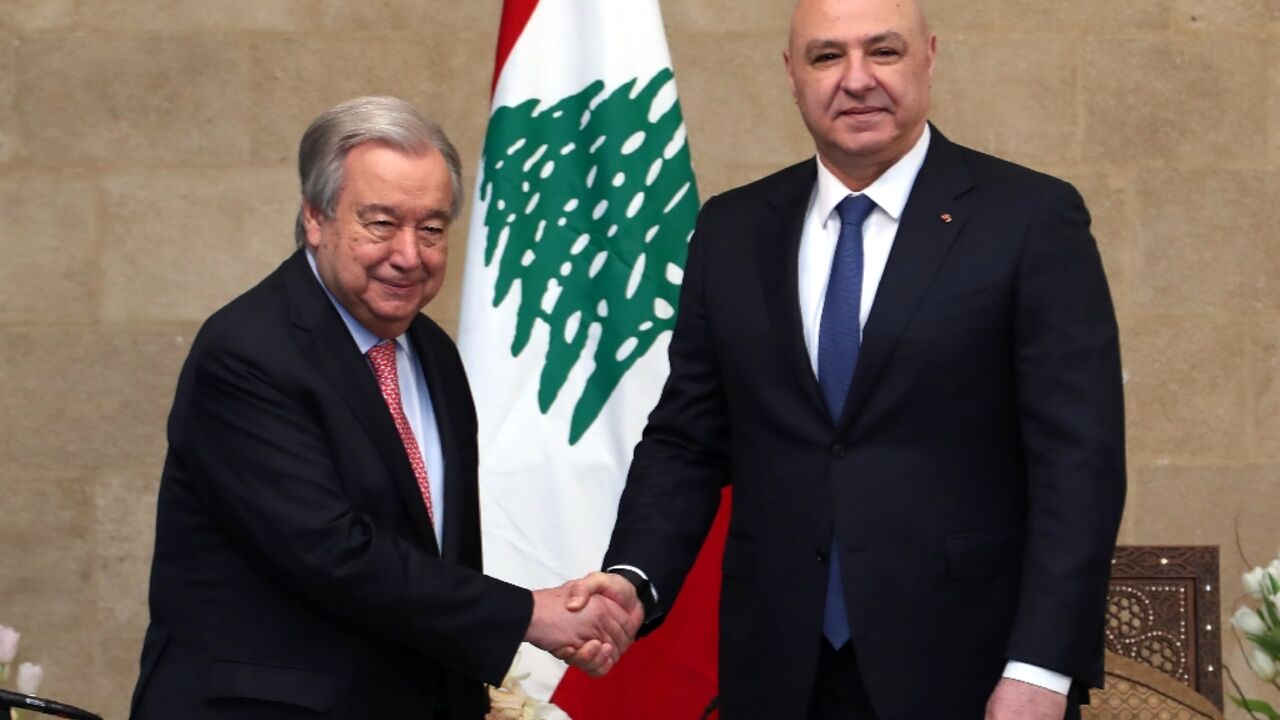 This handout picture provided by the press office of the Lebanese presidency shows Lebanon's new President Joseph Aoun meeting UN Secretary General Antonio Guterres