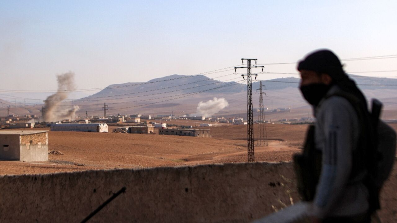 The Turkish-backed Syrian National Army has been battling Kurdish-led forces The Turkish-backed Syrian National Army has been battling Kurdish-led forces