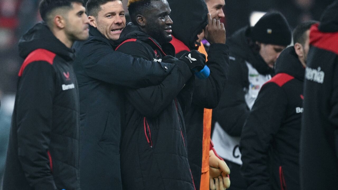 Bayer Leverkusen coach Xabi Alonso embraces striker Victor Boniface after he scored the winner in a 3-2 extra-time German Cup quarter-final win over Cologne Bayer Leverkusen coach Xabi Alonso embraces striker Victor Boniface after he scored the winner in a 3-2 extra-time German Cup quarter-final win over Cologne