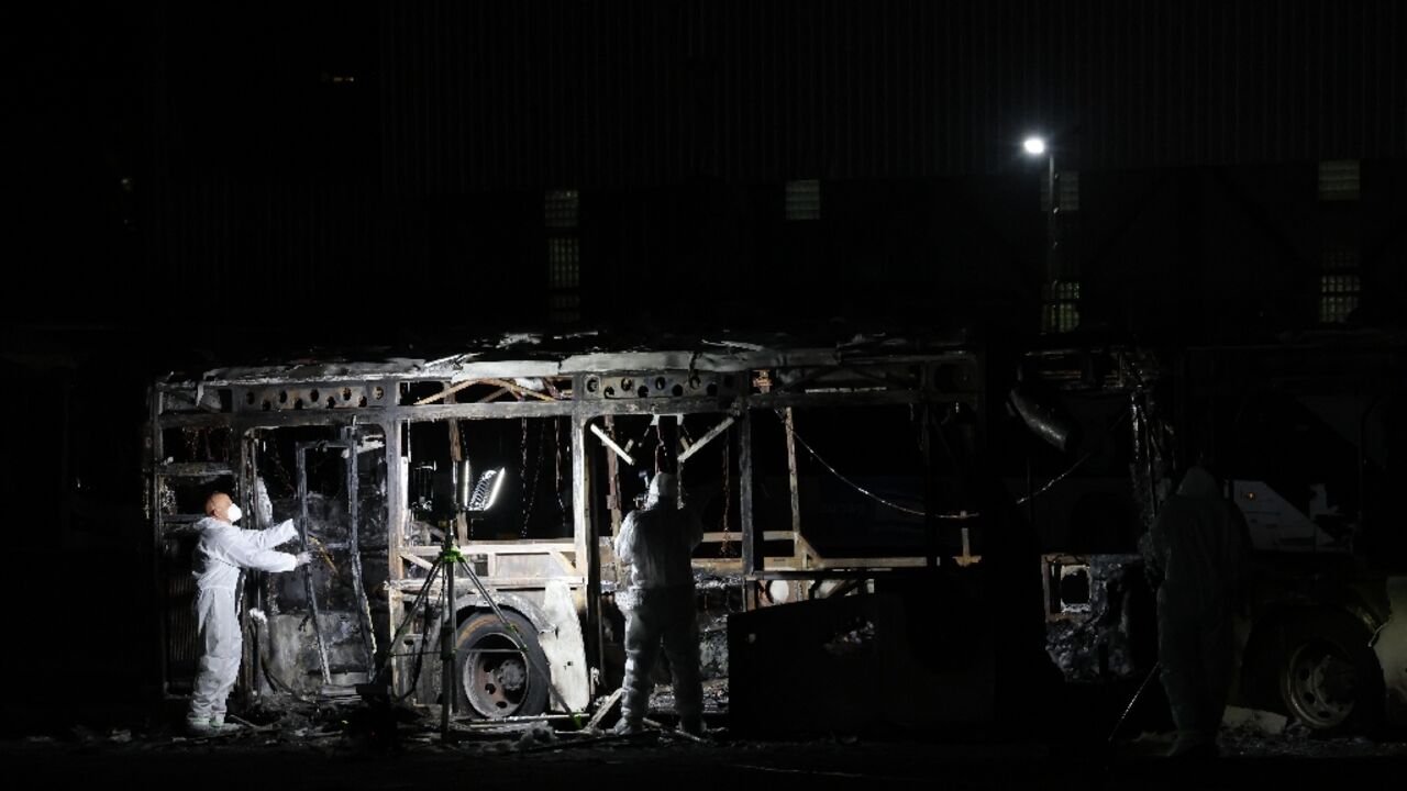 Security forces and bomb disposal units are deployed to the scene of a bus explosion in Bat Yam Security forces and bomb disposal units are deployed to the scene of a bus explosion in Bat Yam