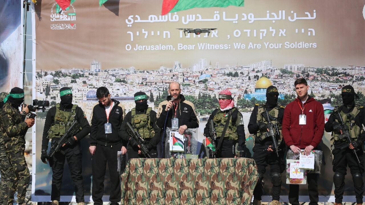 Israeli-American Sagui Dekel-Chen, Israeli-Argentine Yair Horn and Israeli-Russian Sasha Trupanov were paraded on stage before Gaza militants handed them over to the Red Cross in the latest hostage release under a truce deal with Israel Israeli-American Sagui Dekel-Chen, Israeli-Argentine Yair Horn and Israeli-Russian Sasha Trupanov were paraded on stage before Gaza militants handed them over to the Red Cross in the latest hostage release under a truce deal with Israel