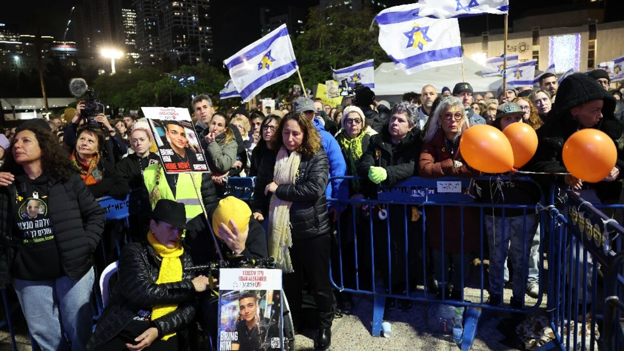 Mourners in Tel Aviv observe a moment of silence in memory of four dead hostages whose bodies were handed over to Israel by Hamas on Thursday Mourners in Tel Aviv observe a moment of silence in memory of four dead hostages whose bodies were handed over to Israel by Hamas on Thursday
