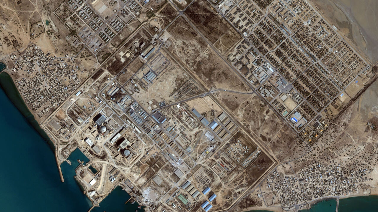 In SPACE - MAY 19: This image captured by a satellite on May 19, 2001 shows the Bushehr Reactor in Iran. The nuclear facility is located approximately 17 kilometers south of the city of Bushehr. The reactor complex occupies a 2.5 Square Kilometer site area, which includes assembly halls, a concrete channel for cooling water that runs from the reactors to the Gulf, and a the harbor, which supports loading and unloading of foreign materials needed for construction and reactor operation. There are two reactor 