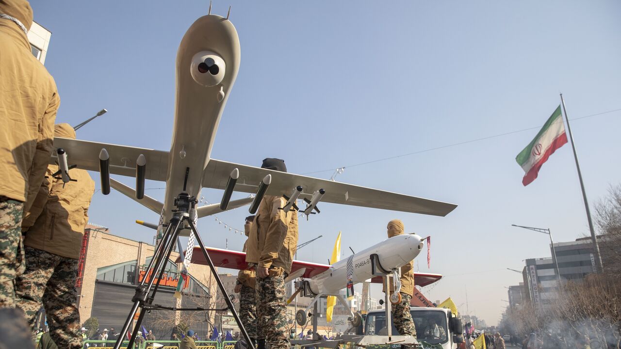  Iranian Basij militia members display their drones during military drills on Jan. 10, 2025, in Tehran, Iran. 