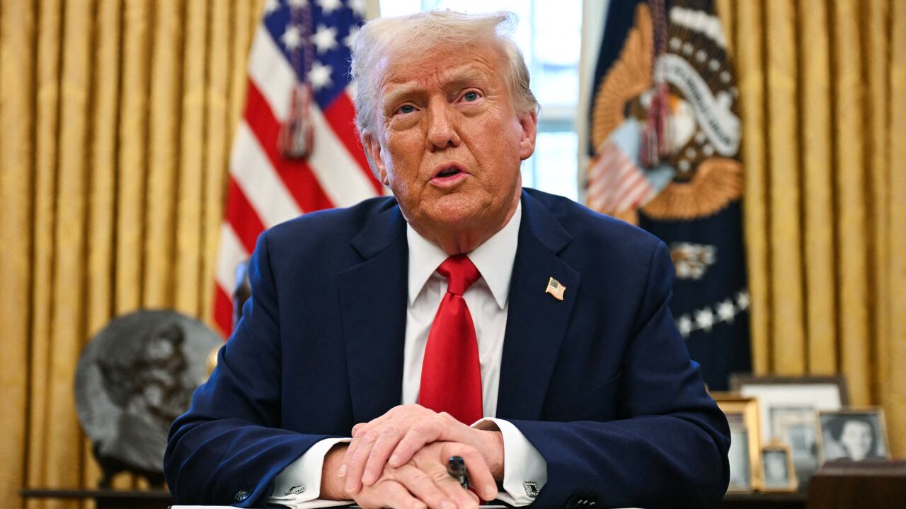 US President Donald Trump speaks to the press as he signs an executive order to create a US sovereign wealth fund in the Oval Office of the White House on Feb. 3, 2025. 