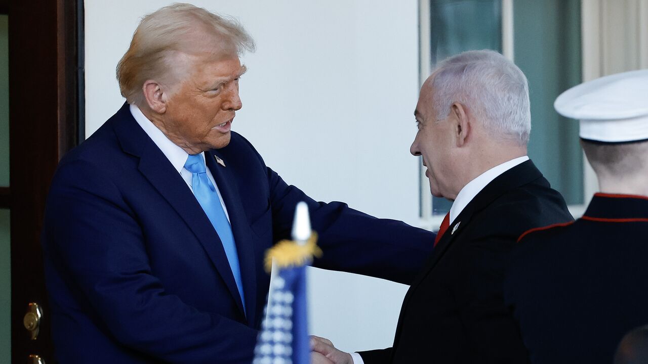 US President Donald Trump greets Israeli Prime Minister Benjamin Netanyahu as he arrives at the White House on Feb. 04, 2025 in Washington, DC. 