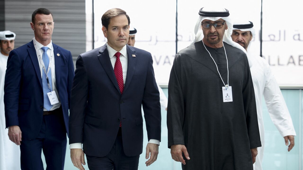 US Secretary of State Marco Rubio (C) walks with UAE President Sheikh Mohamed bin Zayed Al Nahyan as they meet at ADNEC Centre Abu Dhabi in Abu Dhabi, on Feb. 19, 2025.