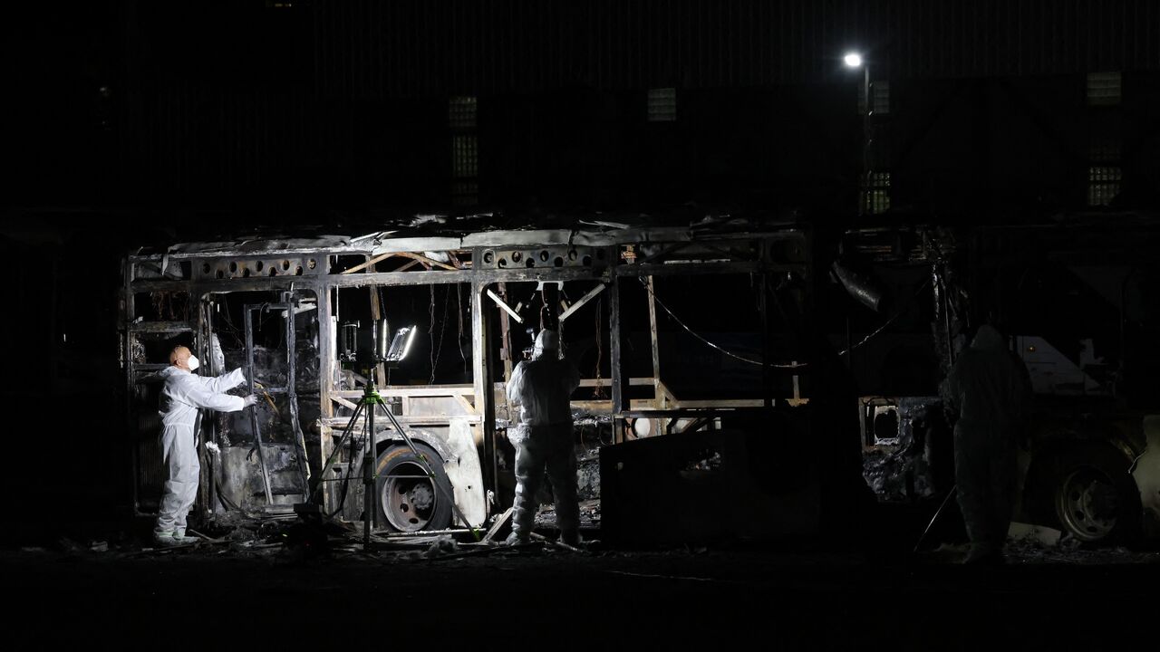 Security forces and bomb disposal units are deployed to the scene of a bus explosion in Bat Yam on Feb. 20, 2025.