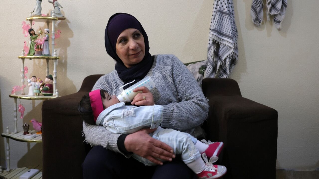 Iman Farhat said the idea for her and her husband to adopt a child 'was cemented by' Gaza's war Iman Farhat said the idea for her and her husband to adopt a child 'was cemented by' Gaza's war