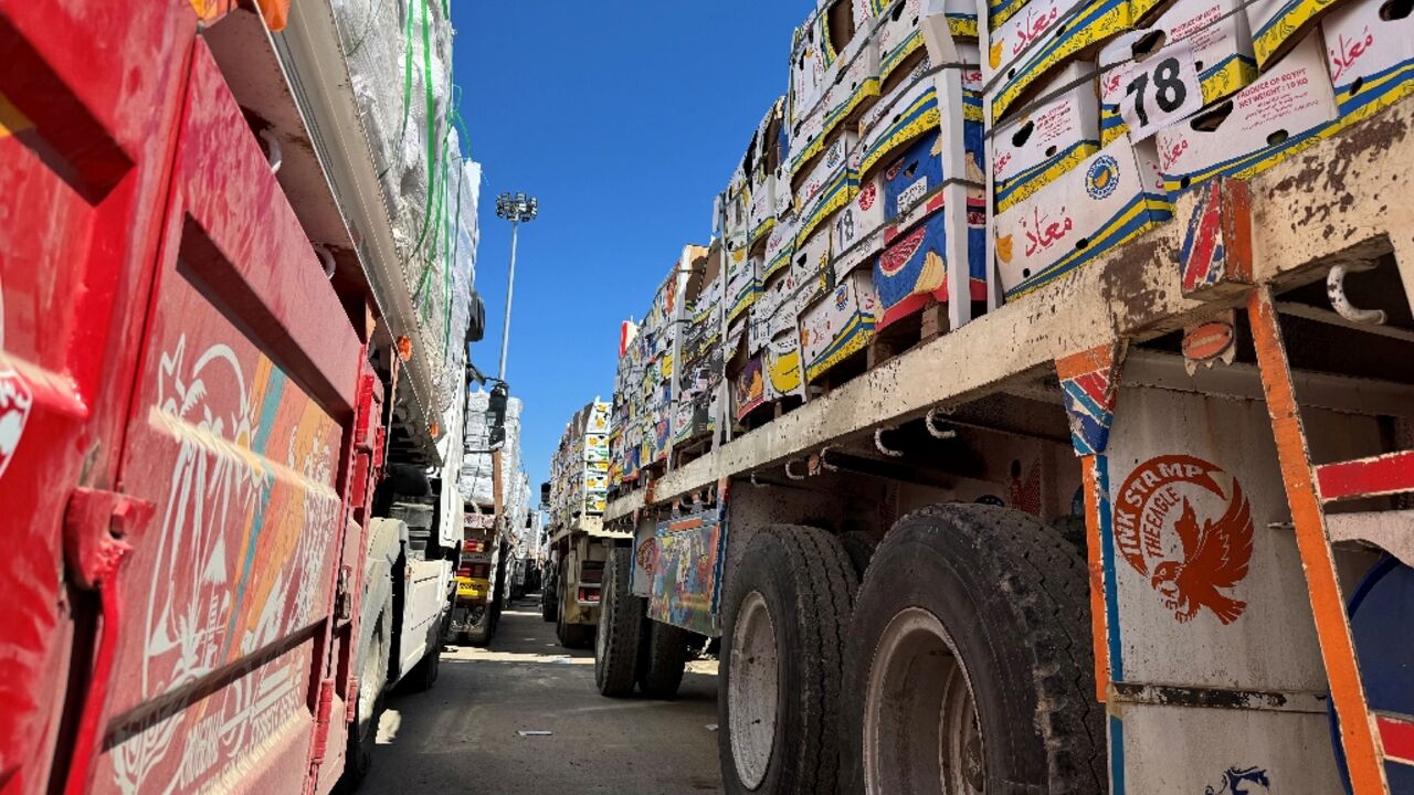 Trucks carrying humanitarian aid line up on the Egyptian side of the Rafah border crossing with the Gaza Strip after Israel suspended the entry of supplies into the Palestinian territory Trucks carrying humanitarian aid line up on the Egyptian side of the Rafah border crossing with the Gaza Strip after Israel suspended the entry of supplies into the Palestinian territory
