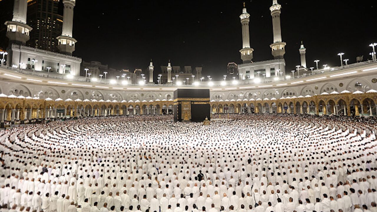Muslims perform the morning prayer around the Kaaba at the Grand Mosque in Saudi Arabia's holy city of Mecca, early on March 30, 2025.