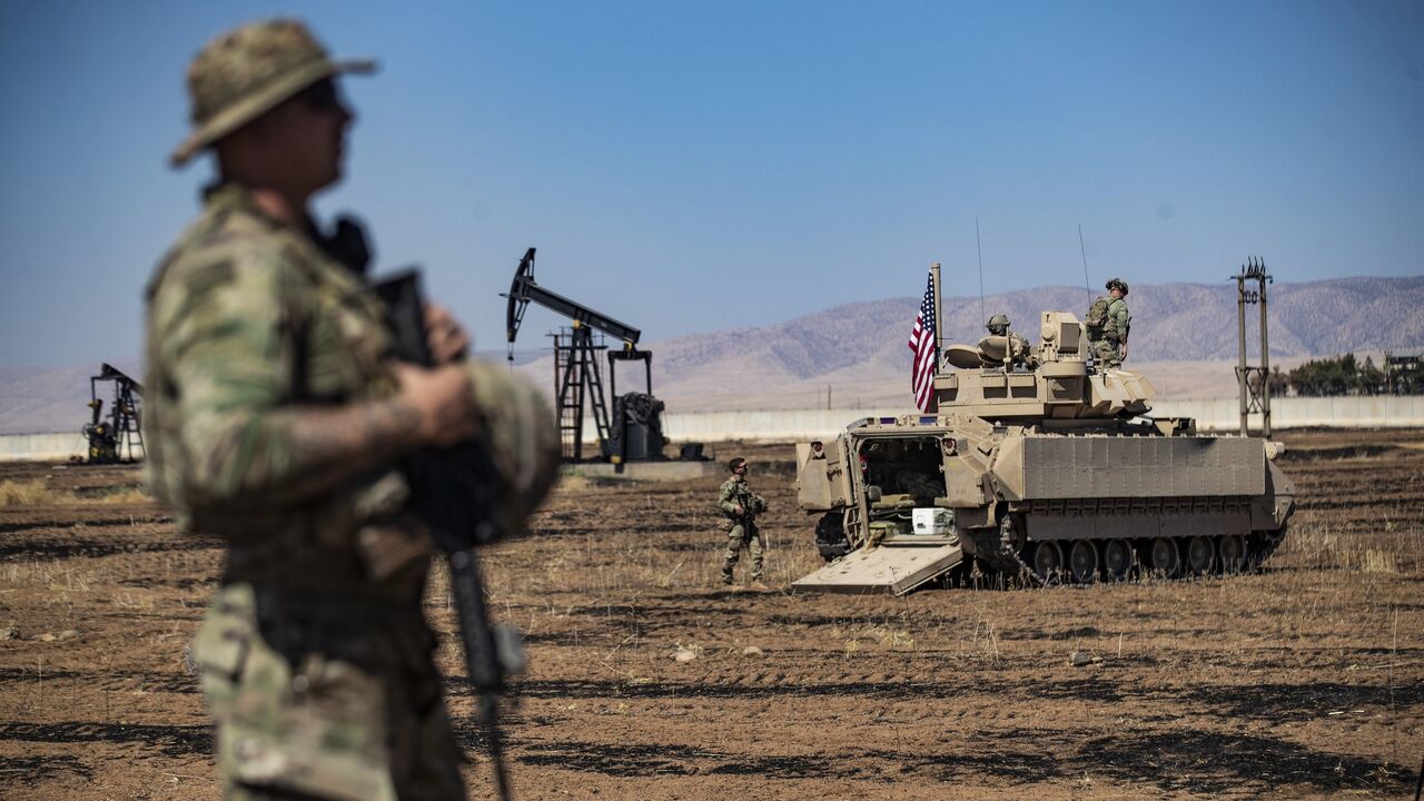 US forces patrol oil fields near Syria's northeastern border with Turkey in the Qahtaniyah countryside in the far northeast corner of Hasakeh province on Sept. 3, 2024.