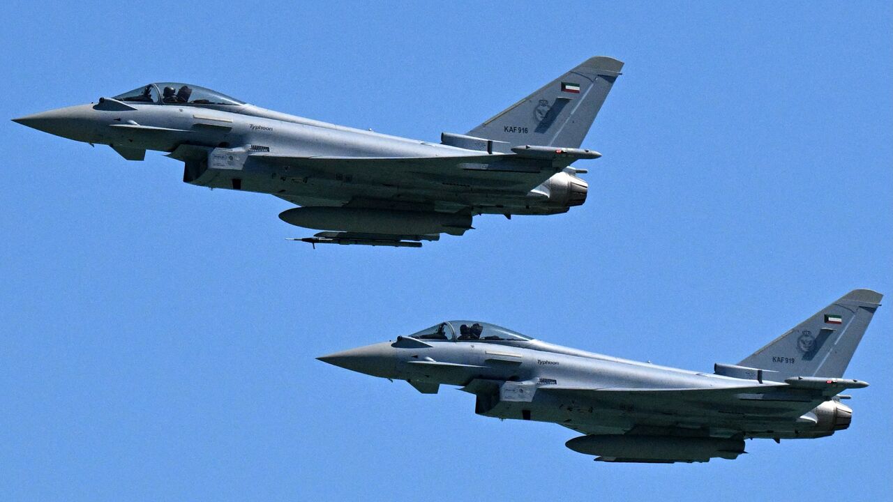 Eurofighter Typhoon fighter aircraft from the Kuwaiti Air Force fly over during an airshow in Kuwait City, Feb. 25, 2025.
