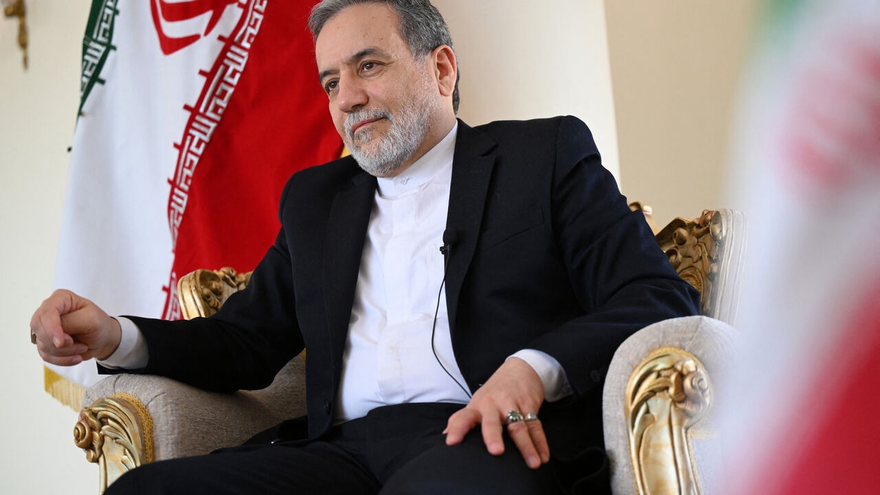 Iran's Foreign Minister Abbas Araghchi speaks to AFP during an interview at the Iranian consulate in Jeddah on March 7, 2025. Iran will not resume negotiations with the United States on its nuclear programme while President Donald Trump applies his "maximum pressure" policy, Foreign Minister Abbas Araghchi told AFP during the interview. (Photo by Amer HILABI / AFP) (Photo by AMER HILABI/AFP via Getty Images)
