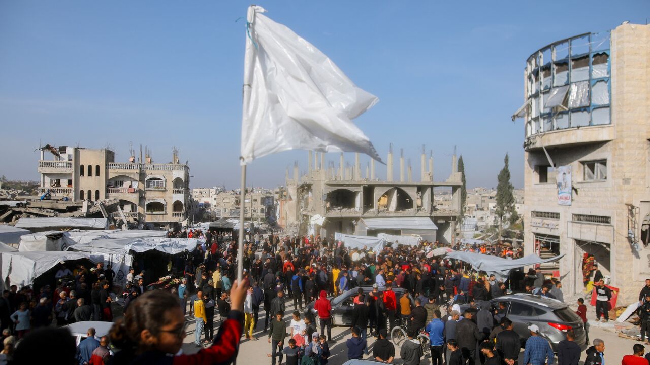 Palestinians chant slogans during an anti-Hamas protest, calling for an end to the war with Israel, in Beit Lahia in the northern Gaza Strip on March 26, 2025.