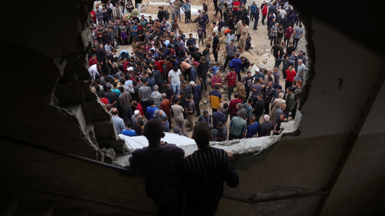 Palestinians bury relatives killed in overnight Israeli strikes in northern Gaza Palestinians bury relatives killed in overnight Israeli strikes in northern Gaza