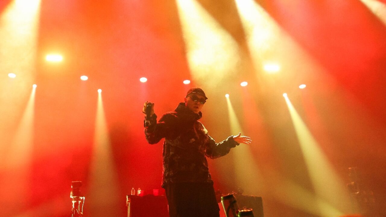 Mo Chara from Irish hip hop trio Kneecap onstage at the 2025 Coachella Valley Mo Chara from Irish hip hop trio Kneecap onstage at the 2025 Coachella Valley