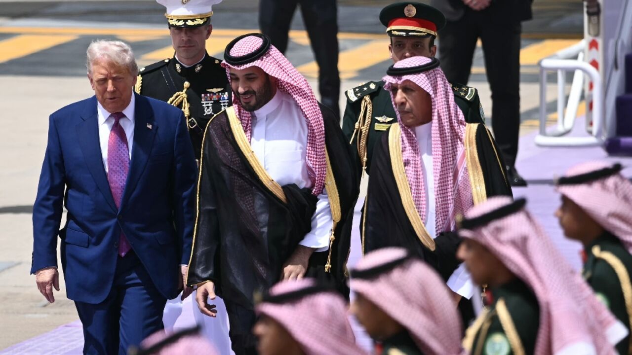US President Donald Trump is greeted by Saudi Crown Prince Mohammed bin Salman upon his arrival in Riyadh