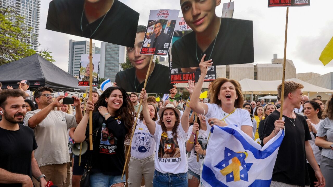Israelis celebrate the release of US-Israeli hostage Edan Alexander from Gaza