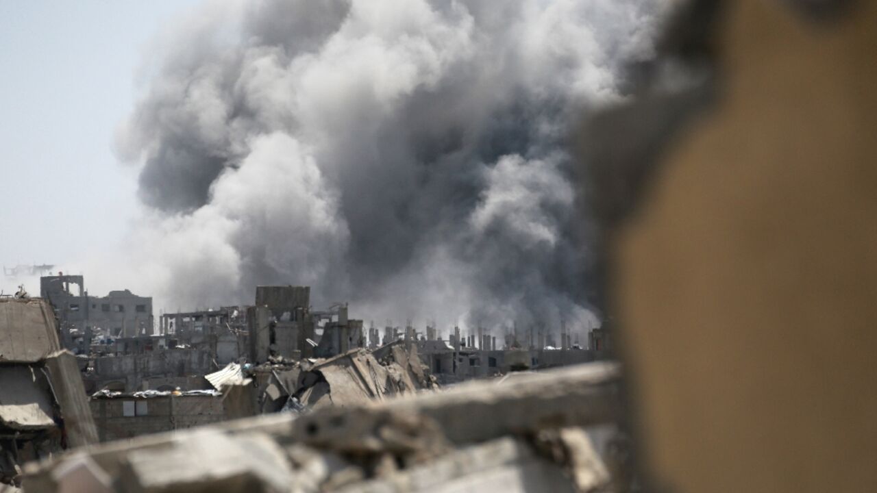 Smoke rises from the site of an Israeli strike in the northern Gaza Strip Smoke rises from the site of an Israeli strike in the northern Gaza Strip