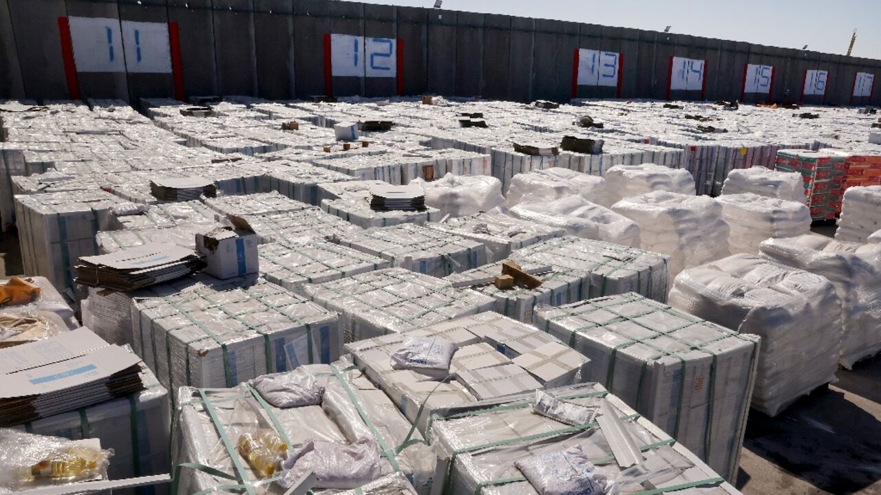 Aid destined for Gaza awaits Israeli authorisation for transportation to Gaza. Aid destined for Gaza awaits Israeli authorisation for transportation to Gaza.