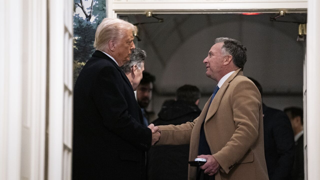 President Donald Trump shakes hands with Steve Witkoff, special envoy to the Middle East at the White House on Feb. 11, 2025.