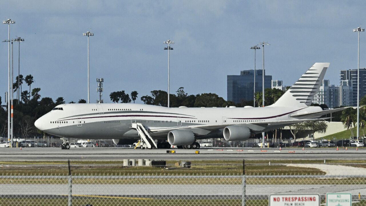 A Qatari Boeing 747 sits on the tarmac of Palm Beach International airport after US President Donald Trump toured the aircraft on Feb. 15, 2025.