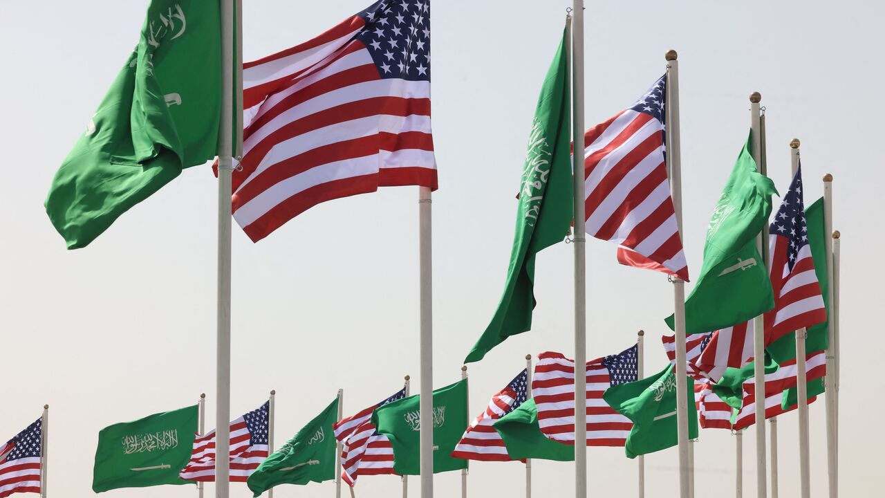 Saudi and US flags flutter on a main road in Riyadh on May 12, 2025, hours before of a visit by US President Donald Trump to the desert kingdom this week.