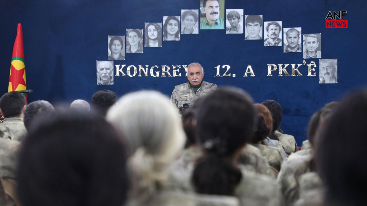 PKK head Murat Karayılan announcing the party's dissolution at an undisclosed location in northern Iraq PKK head Murat Karayılan announcing the party's dissolution at an undisclosed location in northern Iraq