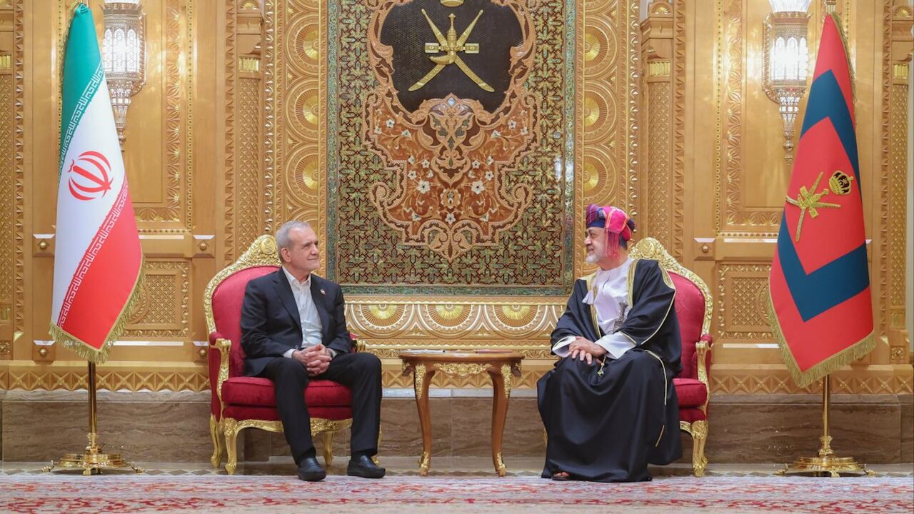 Oman's Sultan Haitham bin Tariq (R) officially welcomes Iranian President Mahmoud Pezeshkian at Muscat's Al Alam Palace, on May 27, 2025.