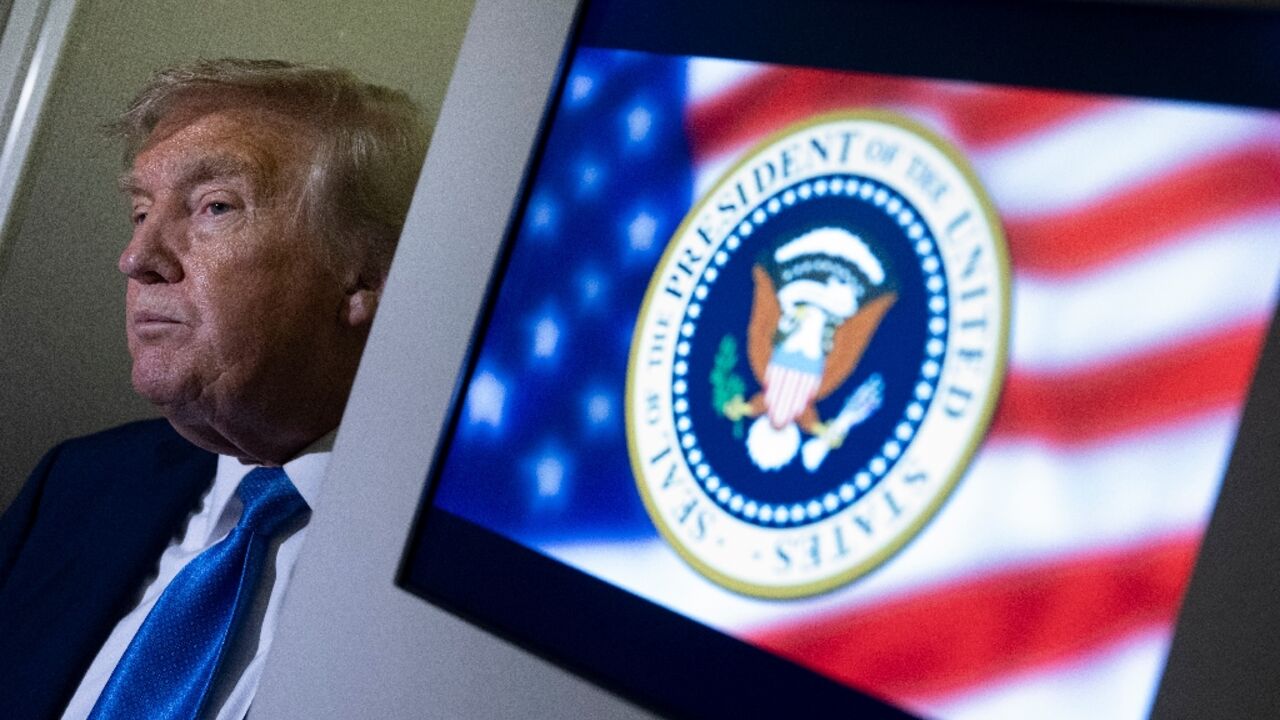 US President Donald Trump speaks to reporters about the G7 Summit aboard Air Force One while travelling back to Washington from Canada US President Donald Trump speaks to reporters about the G7 Summit aboard Air Force One while travelling back to Washington from Canada