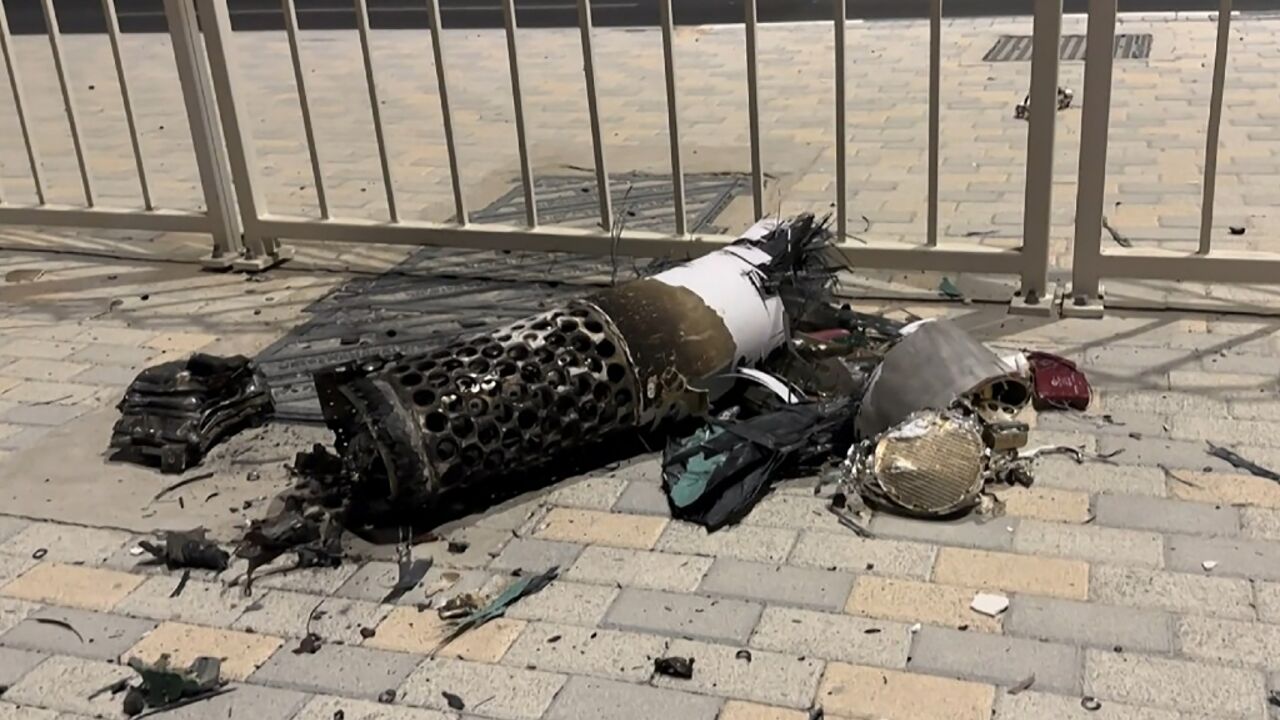 AFPTV footage shows the remnants of an Iranian missile intercepted over Qatar AFPTV footage shows the remnants of an Iranian missile intercepted over Qatar