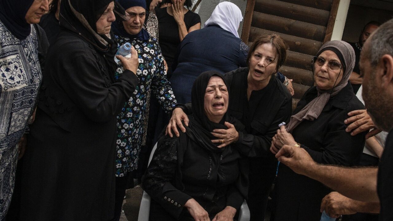 The mother of a victim of an Iranian missile attack that hit the Arab town on Tamra in northern Israel, during the funeral The mother of a victim of an Iranian missile attack that hit the Arab town on Tamra in northern Israel, during the funeral
