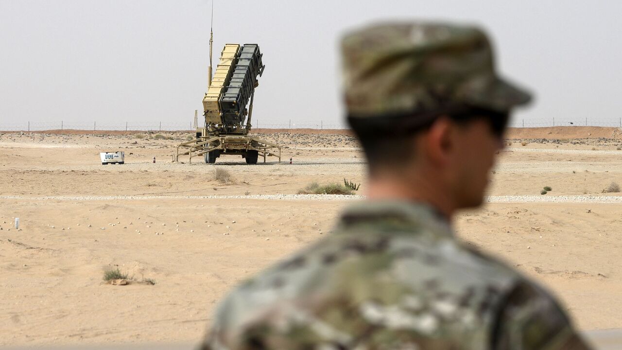 A member of the US Airforce looks on near a Patriot missile battery at the Prince Sultan air base in Al-Kharj, in central Saudi Arabia on February 20, 2020. (Photo by Andrew CABALLERO-REYNOLDS / POOL / AFP) (Photo by ANDREW CABALLERO-REYNOLDS/POOL/AFP via Getty Images)