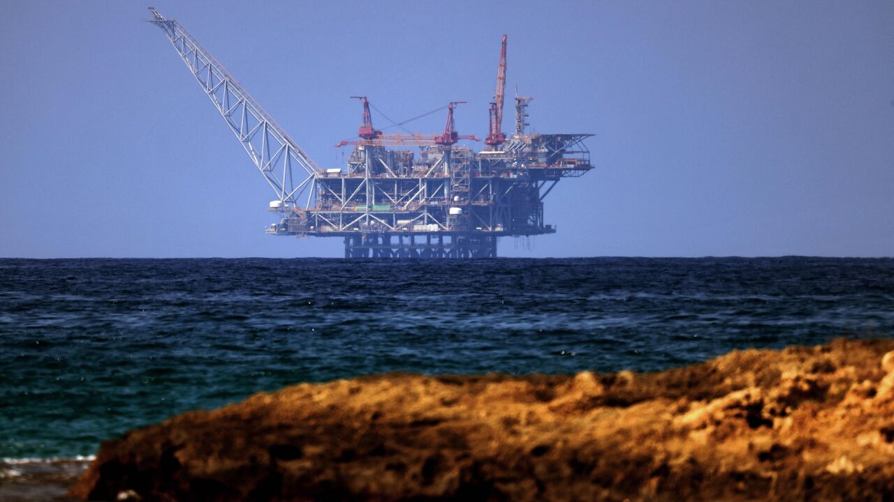 A view of the platform of the Leviathan natural gas field in the Mediterranean Sea is pictured from the Israeli northern coastal beach of Nasholim, on Aug. 29, 2022.