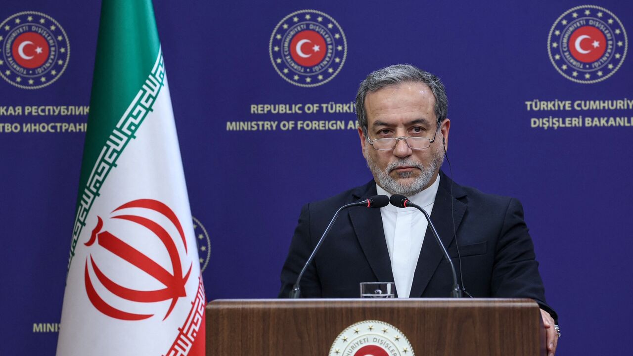 Iranian Foreign Minister Abbas Araghchi holds a joint press conference with Turkish Foreign Minister after their meeting in Ankara, on Dec. 2, 2024.
