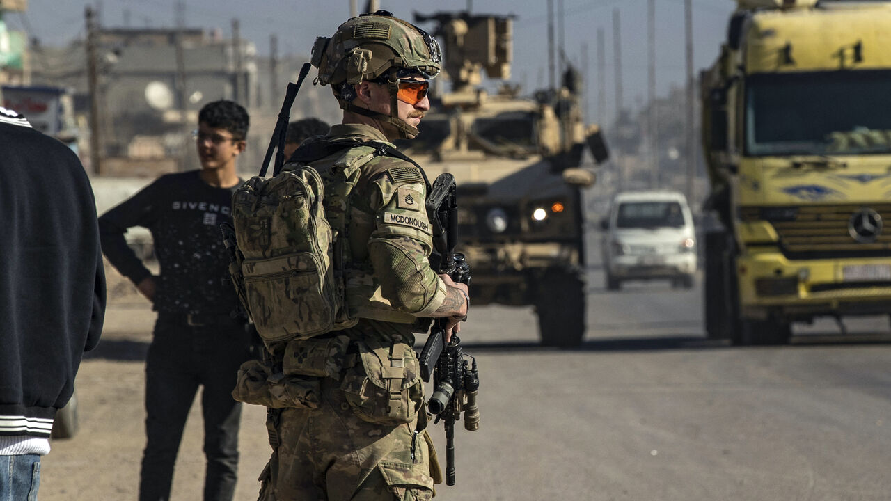 A US soldier keeps watch during a patrol in Syria's northeastern city Qamishli, in the Hasakeh province, mostly controlled by Kurdish-led Syrian Democratic Forces (SDF), on Jan. 9, 2025.