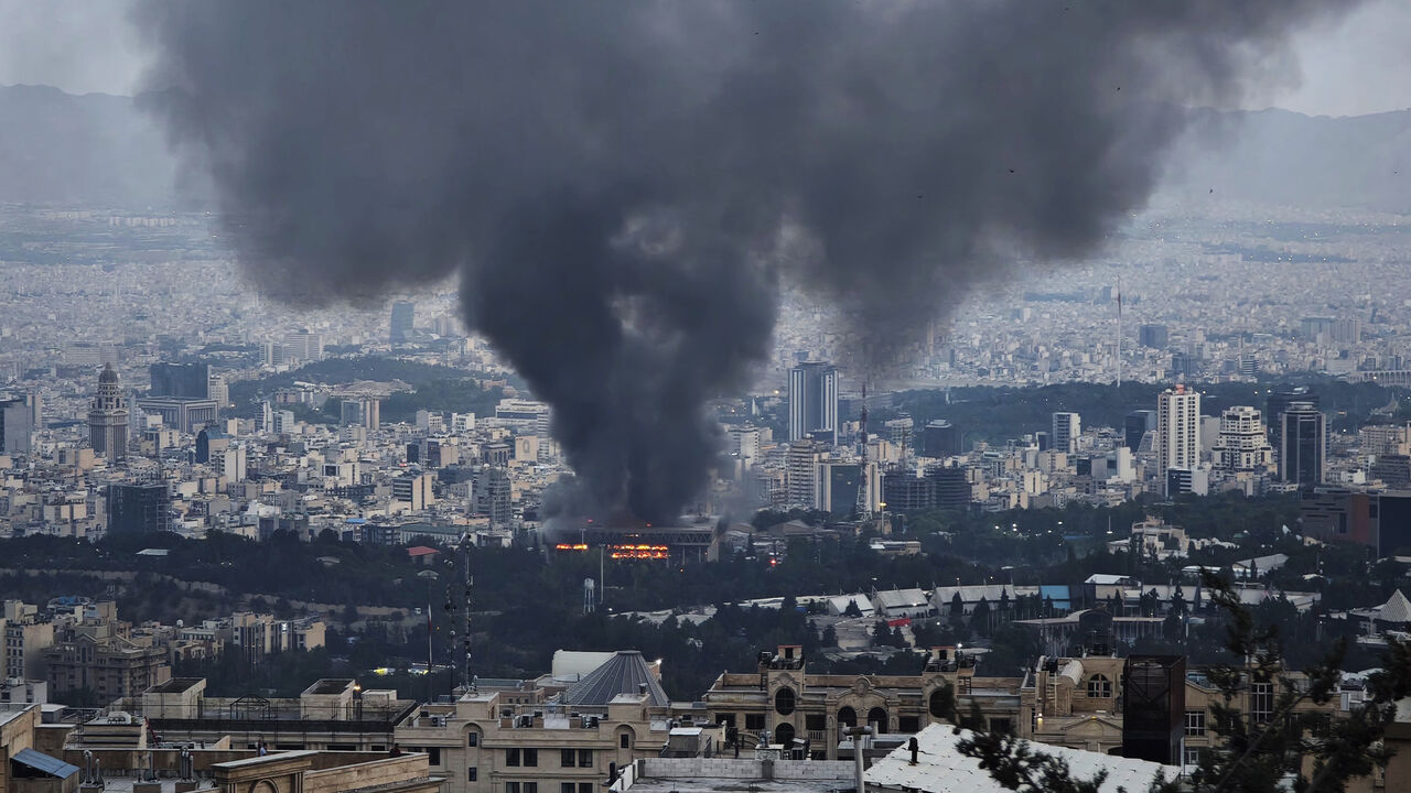 Smoke rises after a reported Israeli strike on a building used by Islamic Republic of Iran News Network, part of Iran's state TV broadcaster, Tehran, Iran, June 16, 2025.