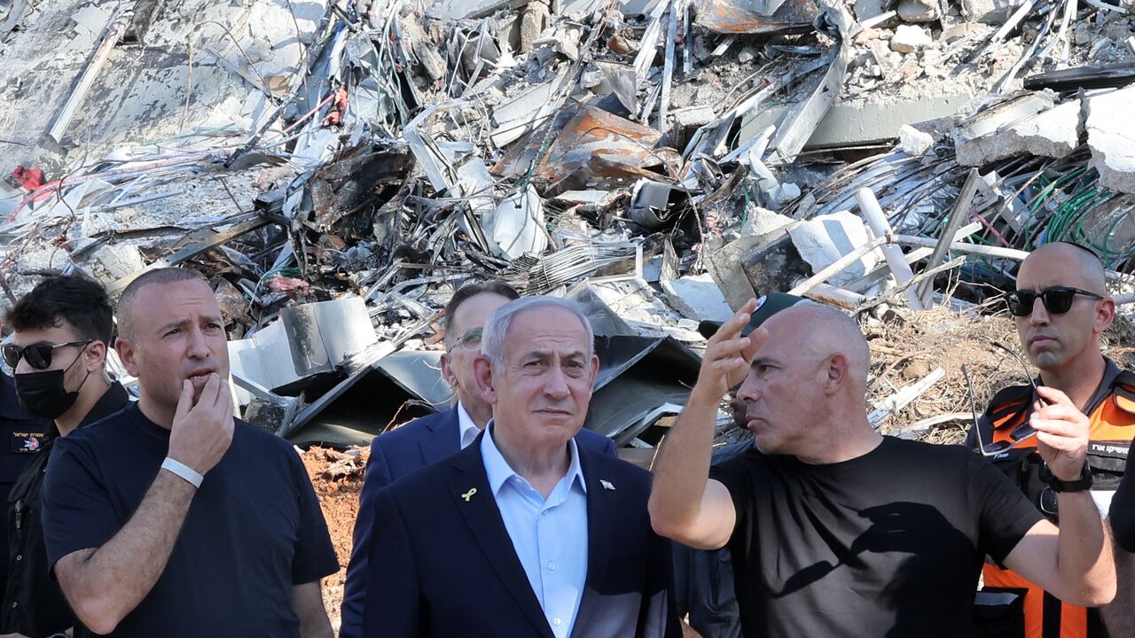 Israel's Prime Minister Benjamin Netanyahu is briefed.