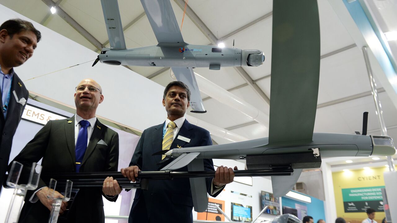 Exhibitors display Israel's Blue Bird aero-systems UAV at the DefExpo 2018, a large defence exhibition showcasing military equipment, on the outskirts of Chennai on April 11, 2018.