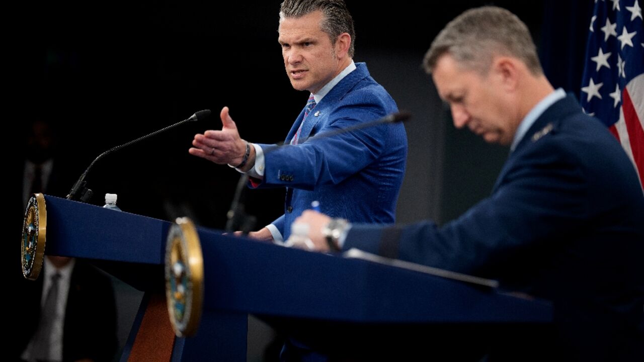 Defense Secretary Pete Hegseth (L) speaks alongside top US military officer General Dan Caine during a news conference at the Pentagon on June 26, 2025 Defense Secretary Pete Hegseth (L) speaks alongside top US military officer General Dan Caine during a news conference at the Pentagon on June 26, 2025