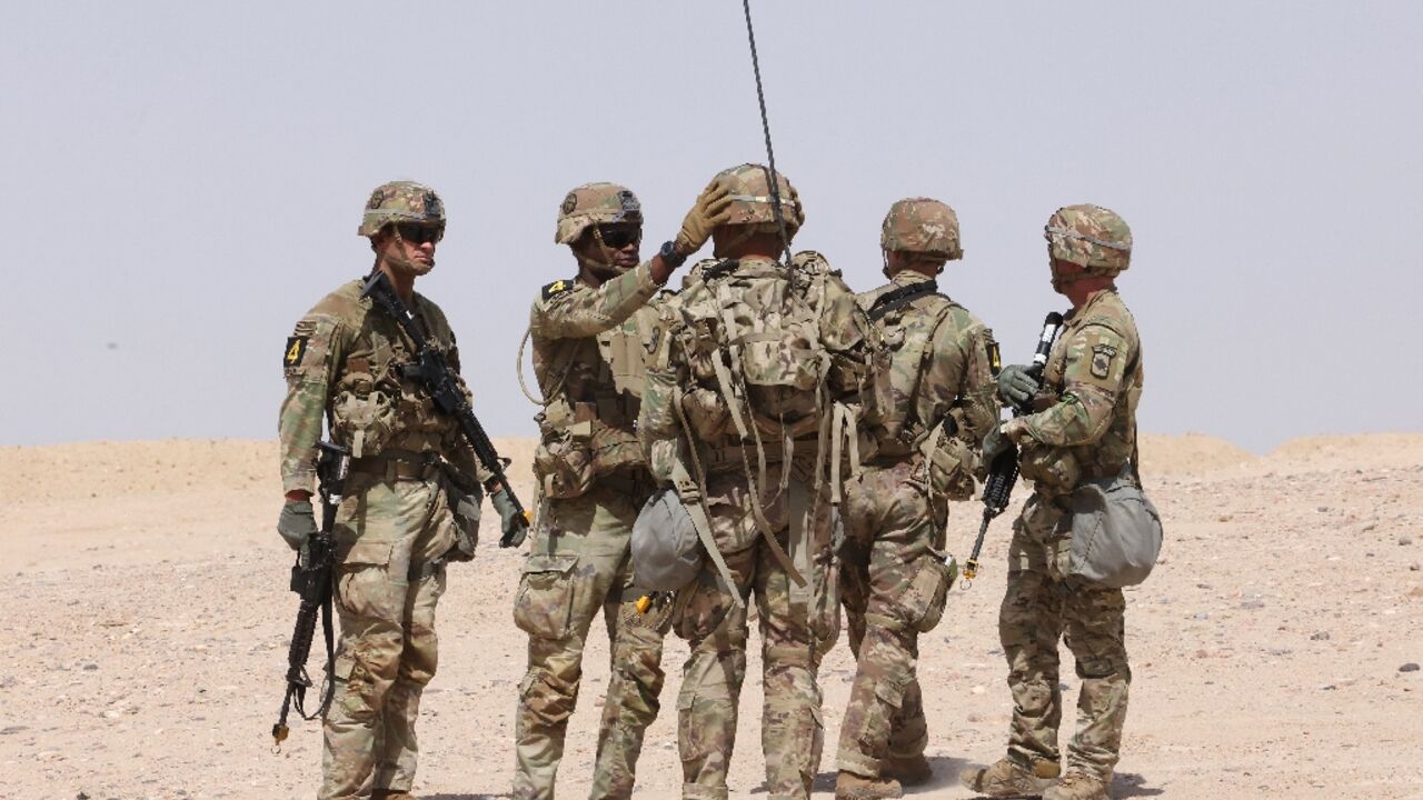 US military personnel participate in a Best Squad Competition at the Buehring base in Udairi, in Kuwait, on May 10, 2023 US military personnel participate in a Best Squad Competition at the Buehring base in Udairi, in Kuwait, on May 10, 2023