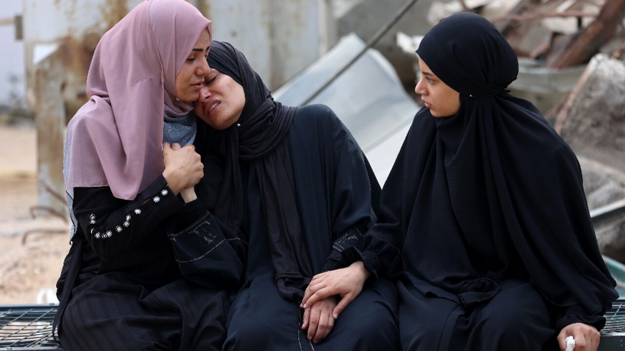 Mourners at a funeral of a Palestinian killed near an aid distribution centre in the Gaza Strip Mourners at a funeral of a Palestinian killed near an aid distribution centre in the Gaza Strip