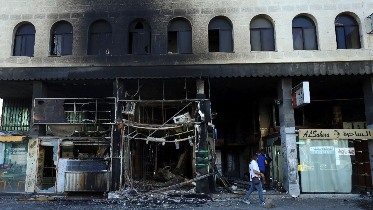 Government forces left behind widespread destruction as they withdrew from the southern Syrian city of Sweida, residents say