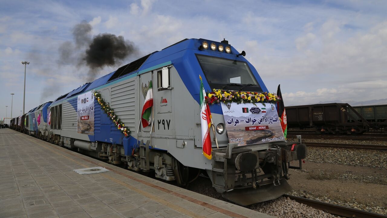 A train moves during the inauguration of a 140-kilometer line running from eastern Iran into western Afghanistan, at a railroad station in Khaf, on Dec. 10, 2020.