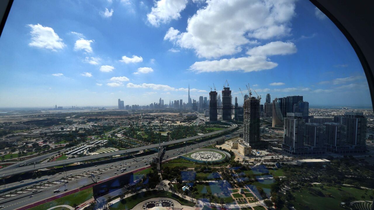 This picture taken on on Feb. 1, 2021 shows a view of the downtown Dubai skyline, with Burj Khalifa, as seen from the Dubai Frame vantage point. 