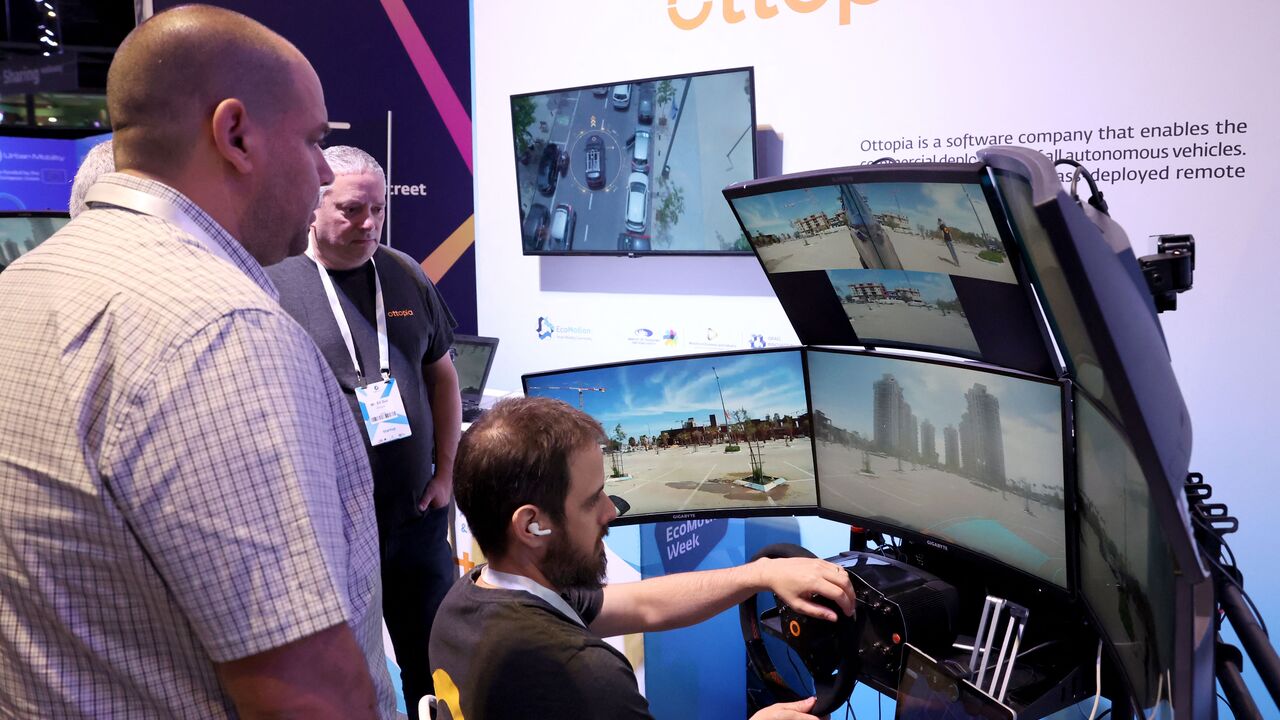 People visit the "EcoMotion Week" trade show on May 11, 2022, in the Israeli coastal city of Tel Aviv.