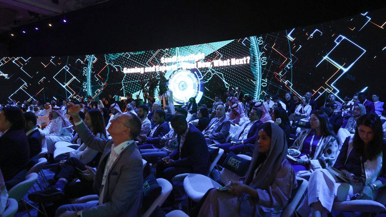 People attend the international esports gamers Next World Forum, in the Saudi capital, Riyadh, on Sept. 7, 2022.